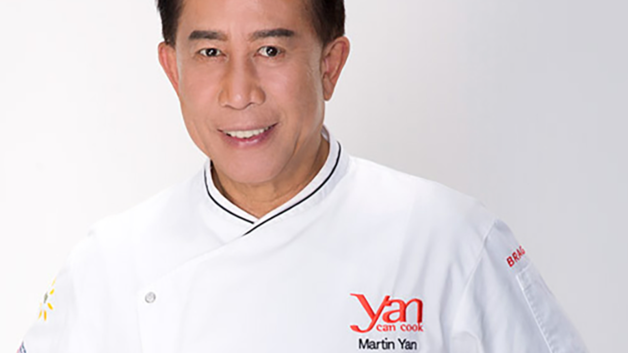Headshot of Chef Martin Yan in a white chef's coat