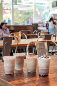 Four Peet's coffee drinks on a table